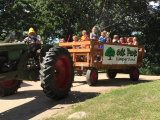 Camping guests going for a wagon ride around Oak Park Kampground
